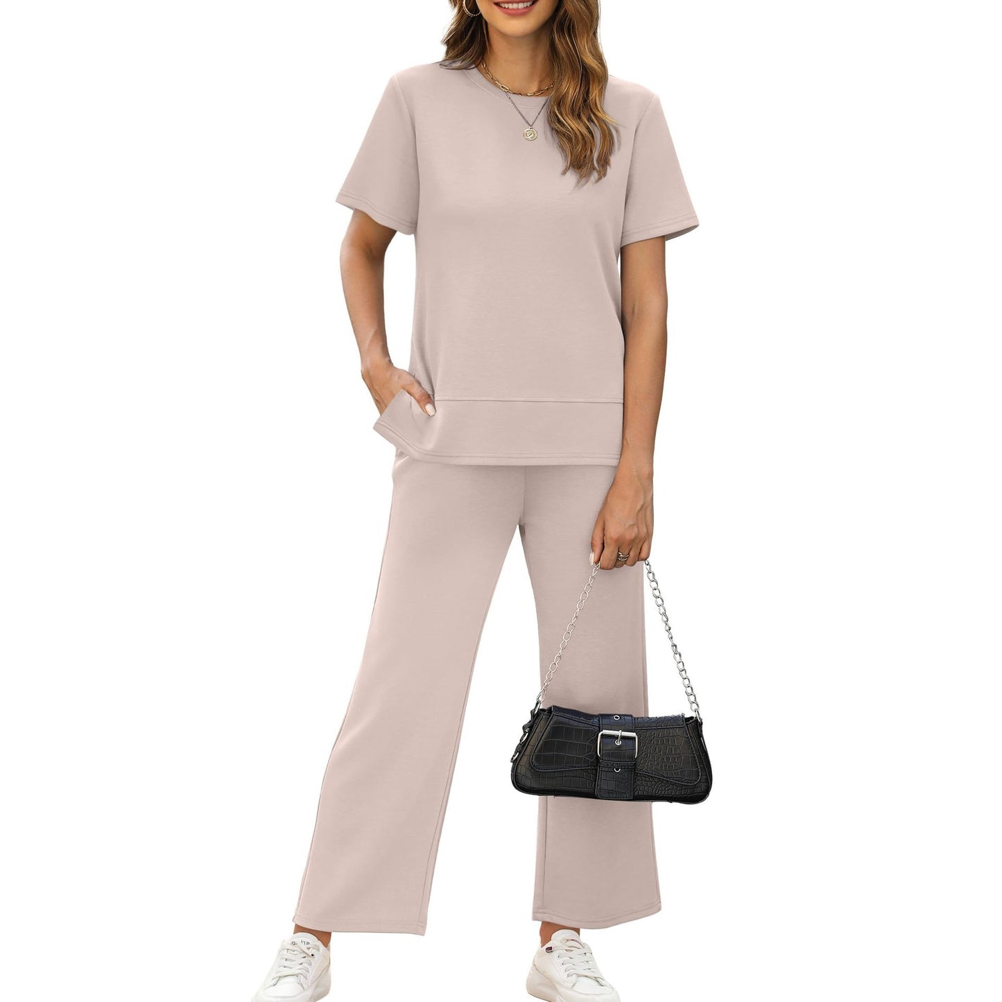 casual summer set featuring loose, wide-leg trousers—perfect for airport travel, beach vacations, and downtime; designed with short sleeves and soft, comfortable fabric