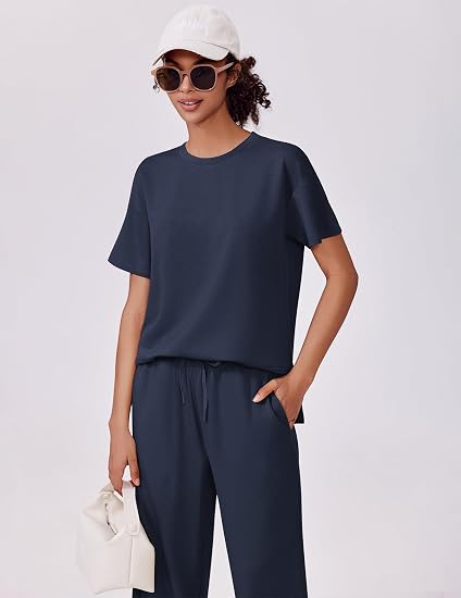 casual summer set featuring loose, wide-leg trousers—perfect for airport travel, beach vacations, and downtime; designed with short sleeves and soft, comfortable fabric