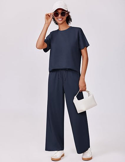 casual summer set featuring loose, wide-leg trousers—perfect for airport travel, beach vacations, and downtime; designed with short sleeves and soft, comfortable fabric