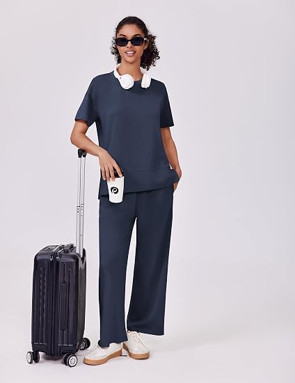 casual summer set featuring loose, wide-leg trousers—perfect for airport travel, beach vacations, and downtime; designed with short sleeves and soft, comfortable fabric