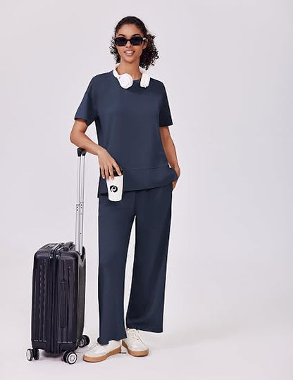 casual summer set featuring loose, wide-leg trousers—perfect for airport travel, beach vacations, and downtime; designed with short sleeves and soft, comfortable fabric