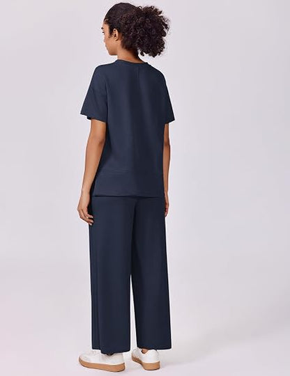 casual summer set featuring loose, wide-leg trousers—perfect for airport travel, beach vacations, and downtime; designed with short sleeves and soft, comfortable fabric